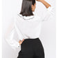 Blusa blanca de volantes