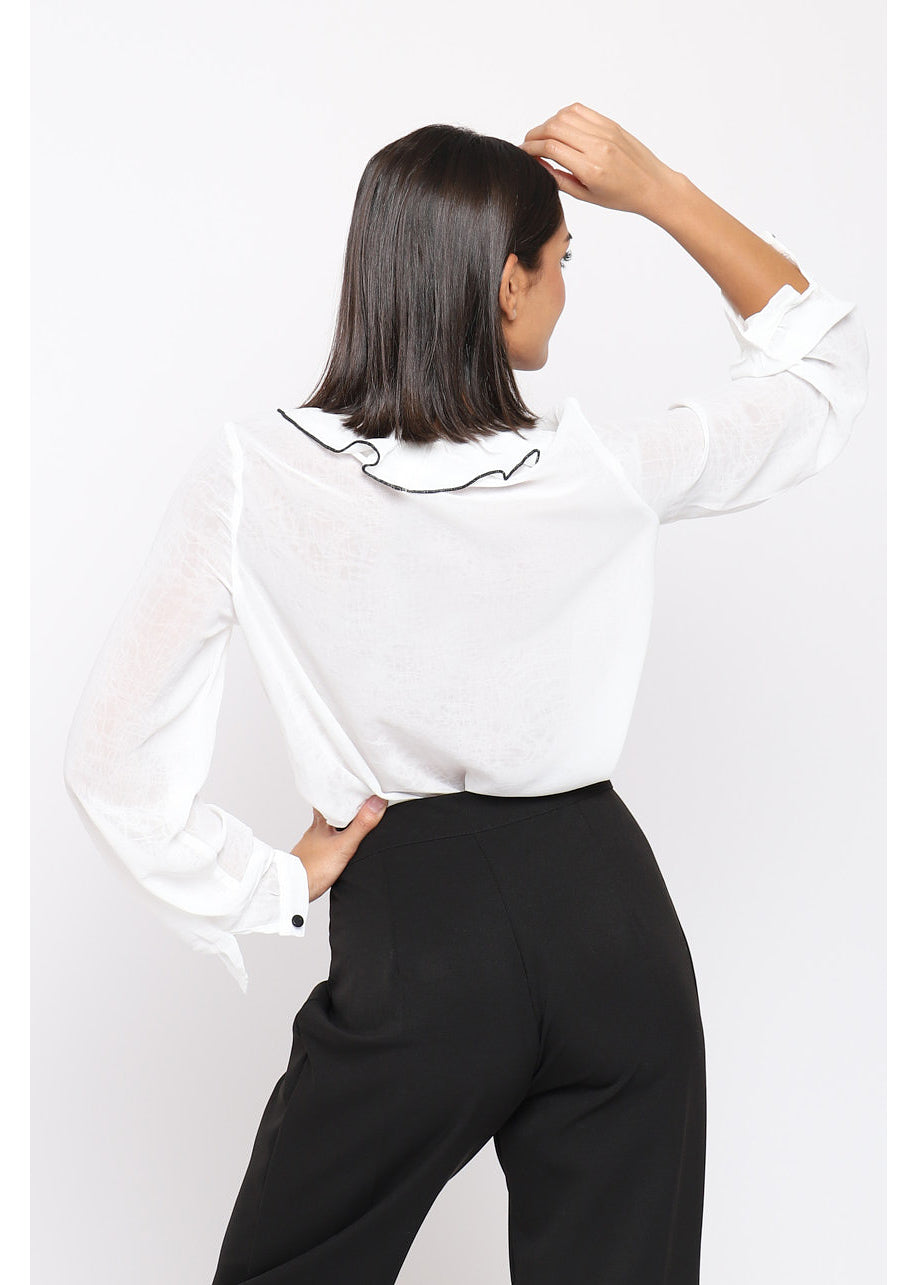 Blusa blanca de volantes